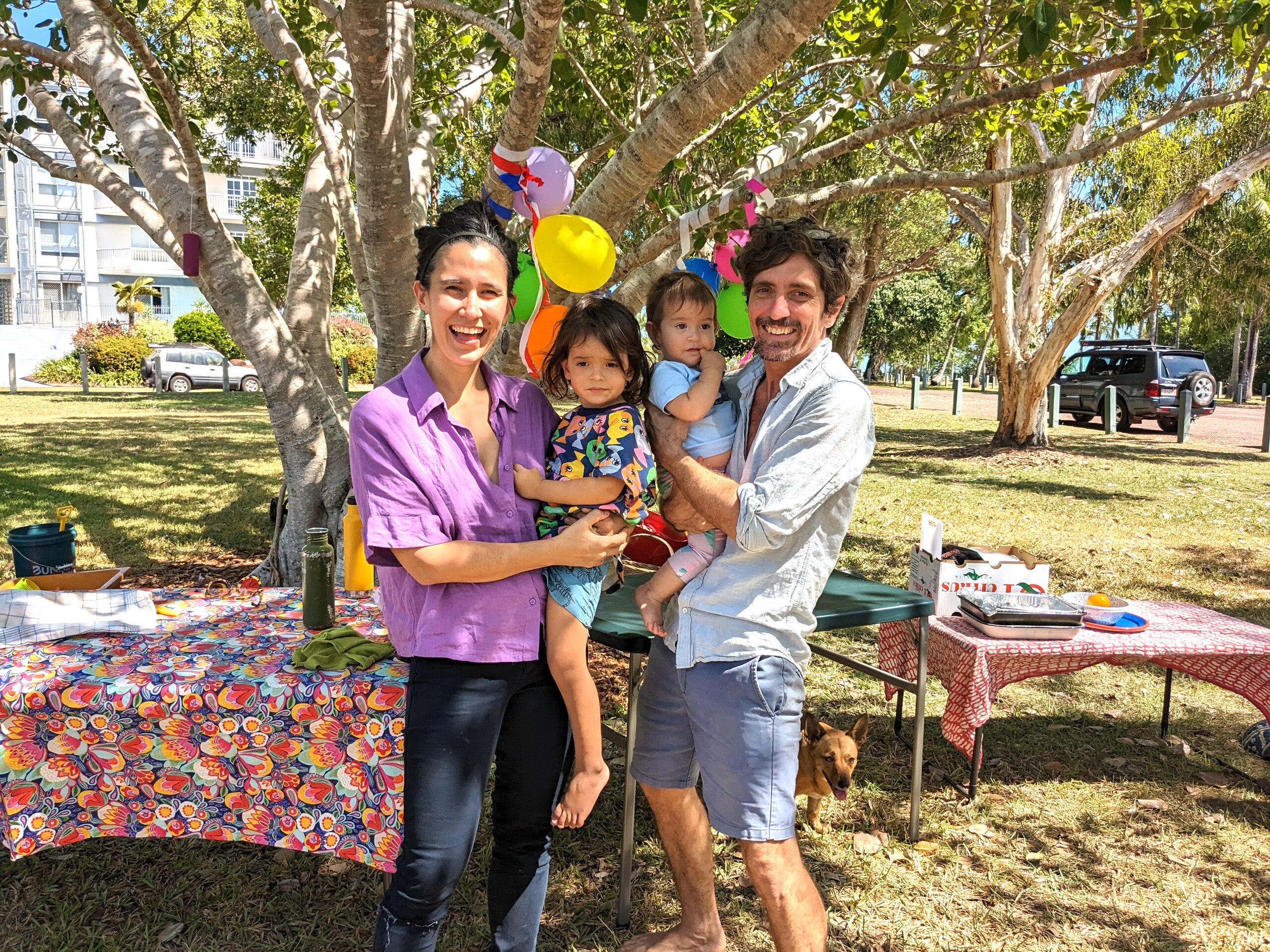 Jess and her family pose for an adorable family phot in the park 