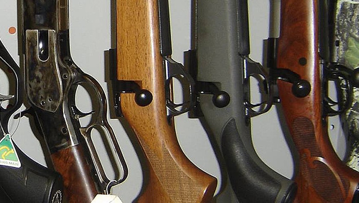Rifles on display at Tasmanian firearms seller.