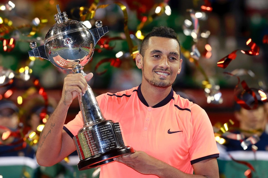 Nick Kyrgios with the trophy after winning Japan Open