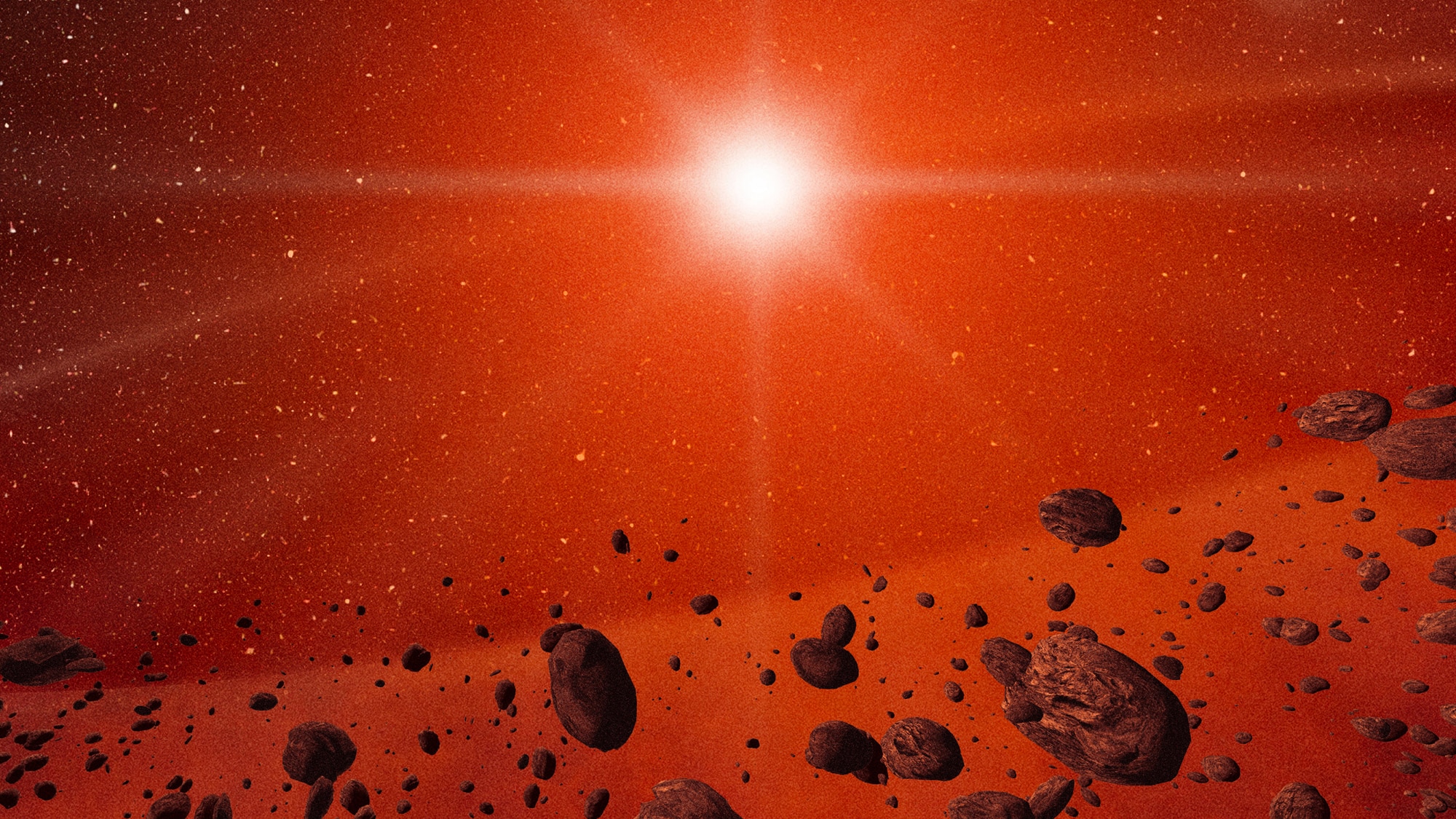 Bright star glowing at the centre, surrounded by red dust and a field of scattered rocky asteroids in space