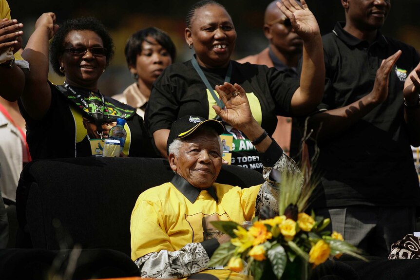 Nelson Mandela waves during the final ANC rally in Johannesburg