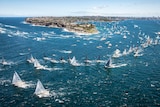 The fleet leaves Sydney Harbour following the start of the Sydney to Hobart yacht race.