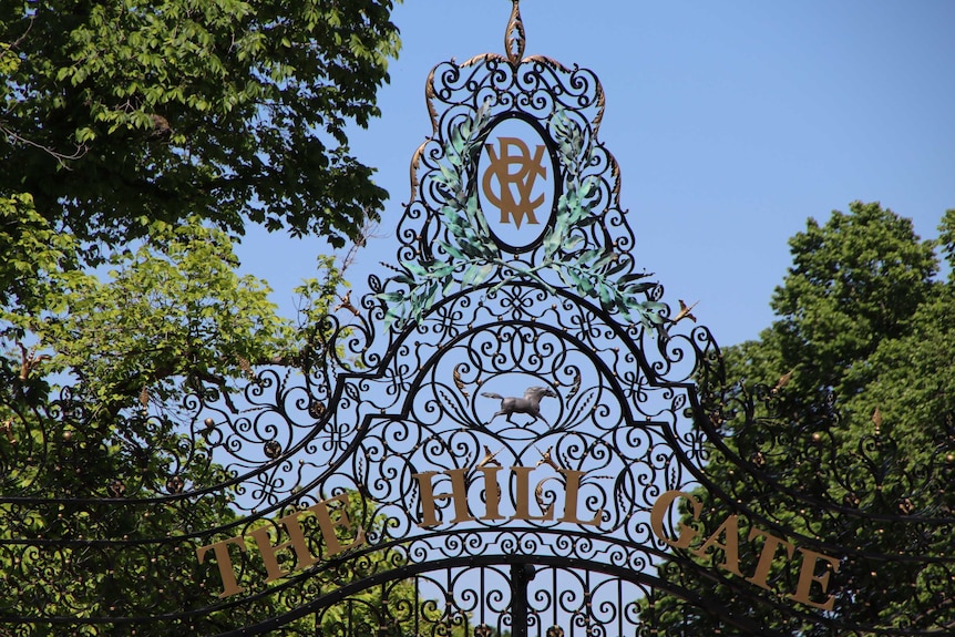 The Hill Gate at Flemington racecourse on a sunny day.