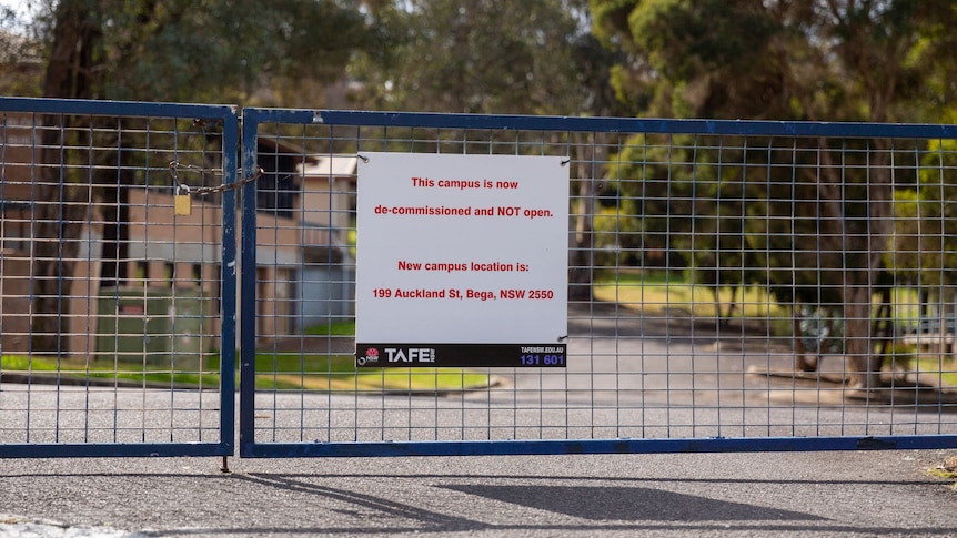 A sign on a gate near a TAFE saying that it is decommissioned. 