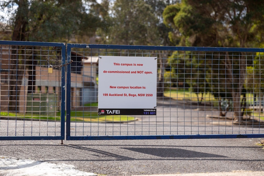 A sign on a gate near a TAFE saying that it is decommissioned. 