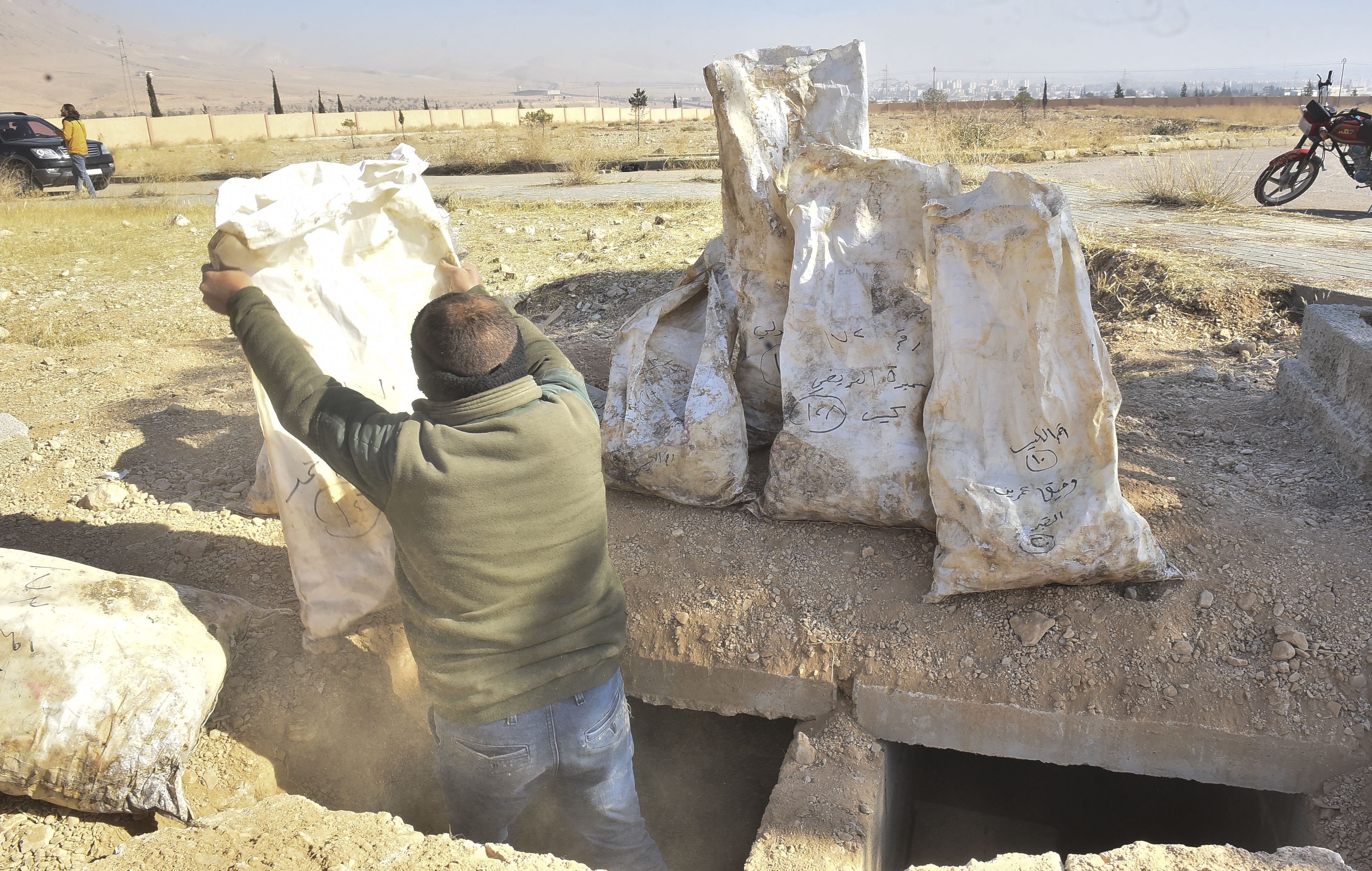 'Explosion of human remains': The damage of Syria's death squads