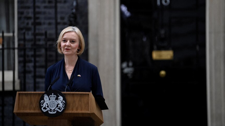 British Prime Minister Liz Truss announces her resignation, outside Number 10 Downing Street.