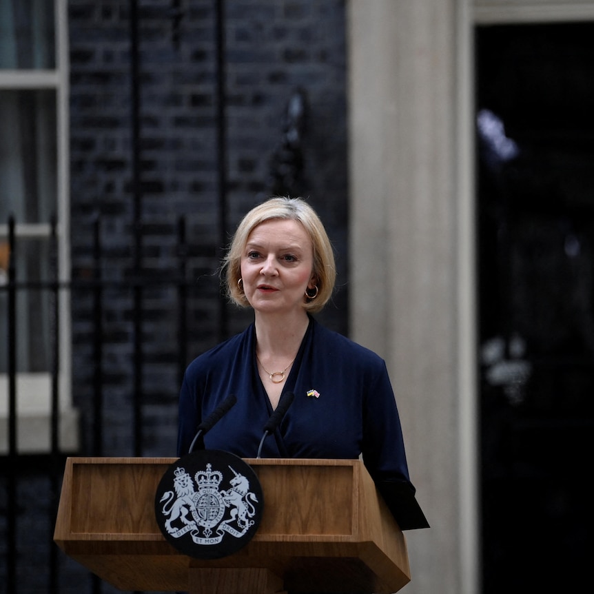 British Prime Minister Liz Truss announces her resignation, outside Number 10 Downing Street.
