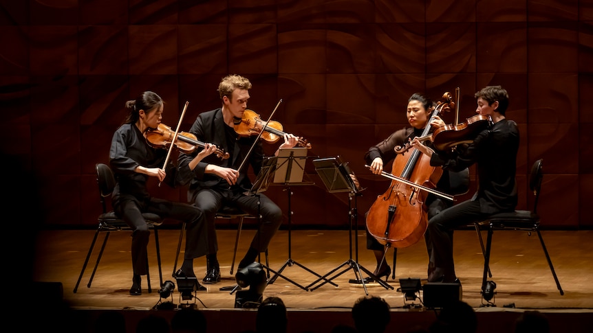 Affinity String Quartet onstage at the Melbourne Recital Centre, dressed in plain black.