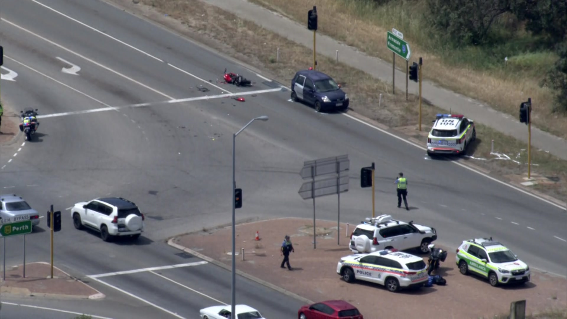 Line markings pictured behind a police car at the scene of a crash