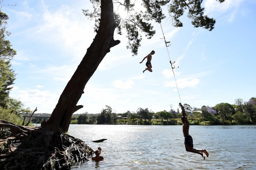 Local kids cool off in the Nepean River during a Sydney heatwave