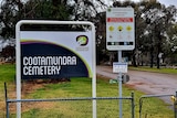 The entrance to the Cootamundra Cemetery, which holds disposable bags for dog owners.