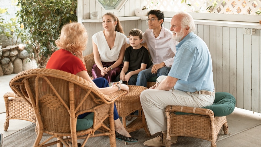 young-family-talking-to-their-parents
