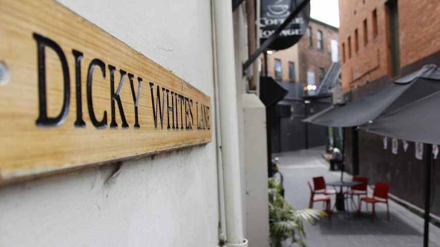 The wooden Dicky White Lane sign