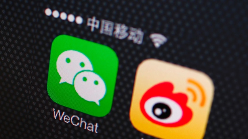 A shot of a phone screen showing WeChat and Weibo apps