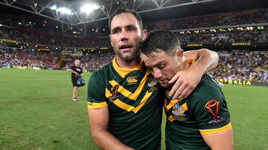 Cameron Smith embraces Cooper Cronk after Rugby League World Cup final.