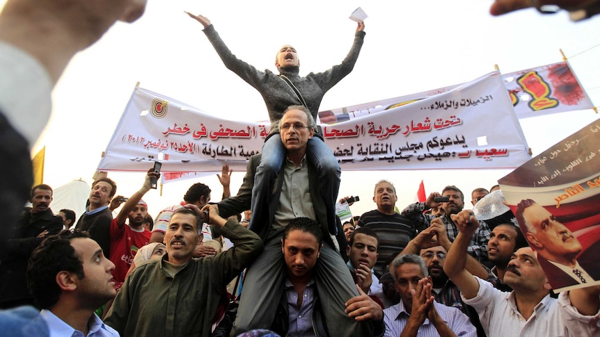 Mohamed Morsi opponents protest at Tahrir Square in Cairo.