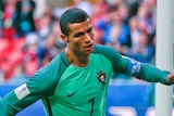 Portugal's Cristiano Ronaldo scores against Russia in Confederations Cup
