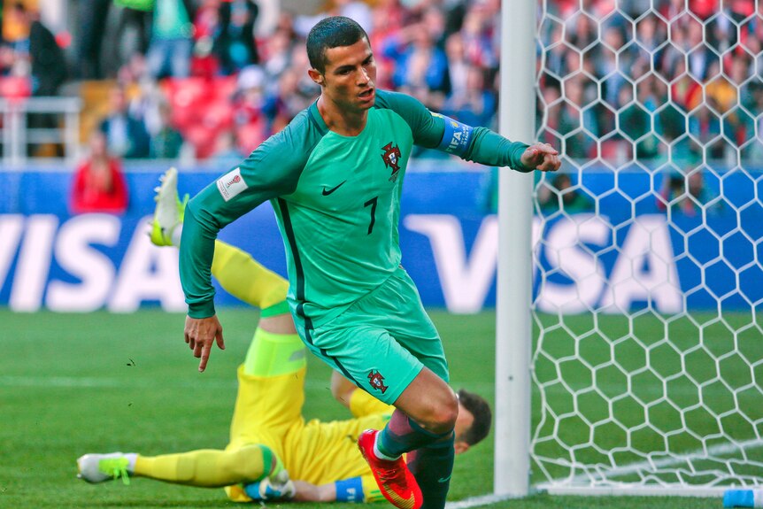 Portugal's Cristiano Ronaldo scores against Russia in Confederations Cup