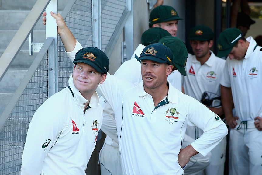 Steve Smith and David Warner rest in the tunnel