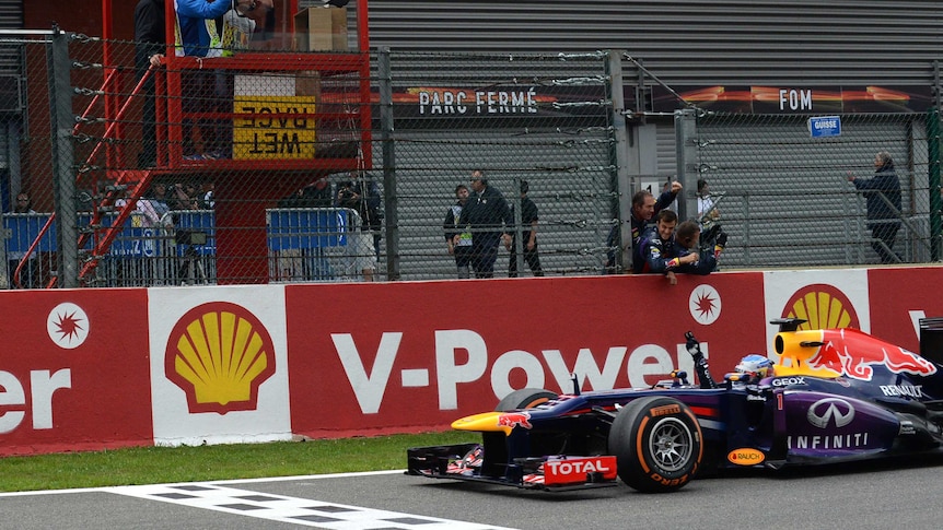 Sebastian Vettel crosses the line first at Spa-Francorchamps