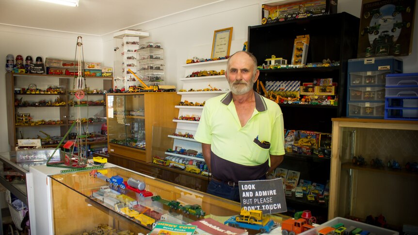 Steve Wohlfeil standing with the collection of toys that he has on display in the shed of his Waikerie property