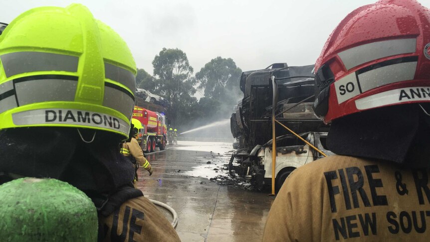 100 cars burnt in car yard in Sydney's south west