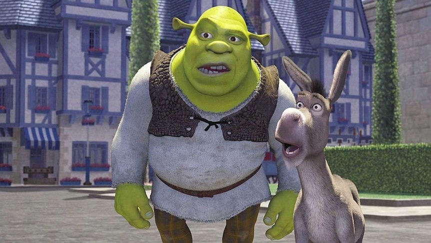 Shrek and donkey in a town square