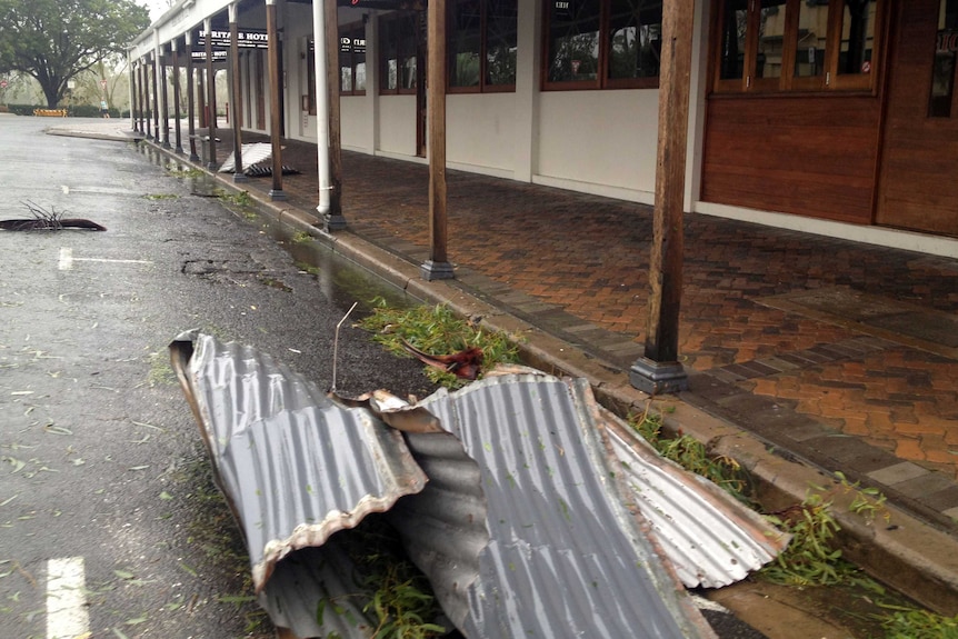 Roofing tin on the ground outside Heritage Hotel, Rockhampton