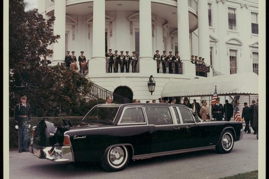 JFK's limousine in the driveway of the White House as it was returned in 1964.
