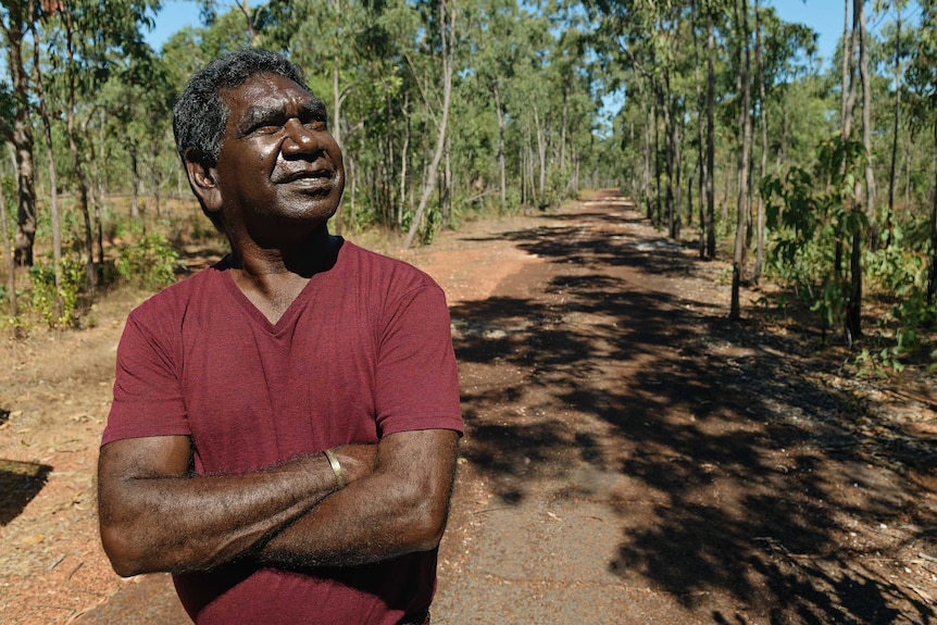 Gumatj man Murphy Yunupingu on a dirt path in East Arnhem Land.