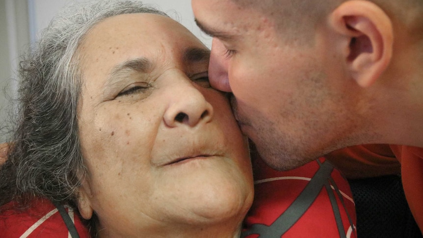 Man kisses his mother