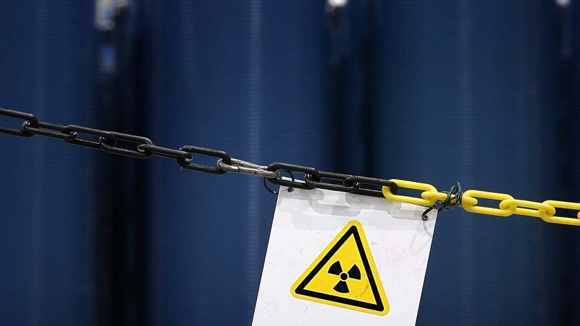 File photo: Chain with nuclear symbol (Reuters: Christian Charisius)