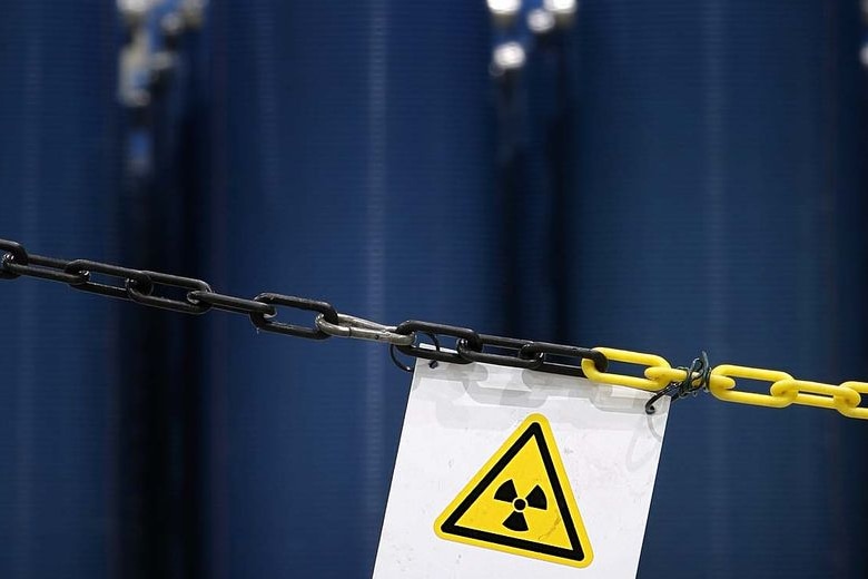 File photo: Chain with nuclear symbol (Reuters: Christian Charisius)