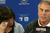 The parents of Thomas Kelly speak at a press conference.