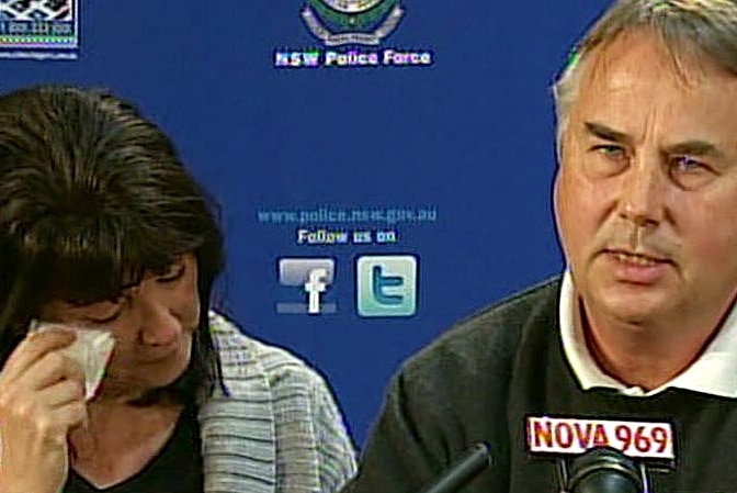 The parents of Thomas Kelly speak at a press conference.