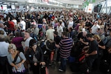 Thousands wait at Sydney airport