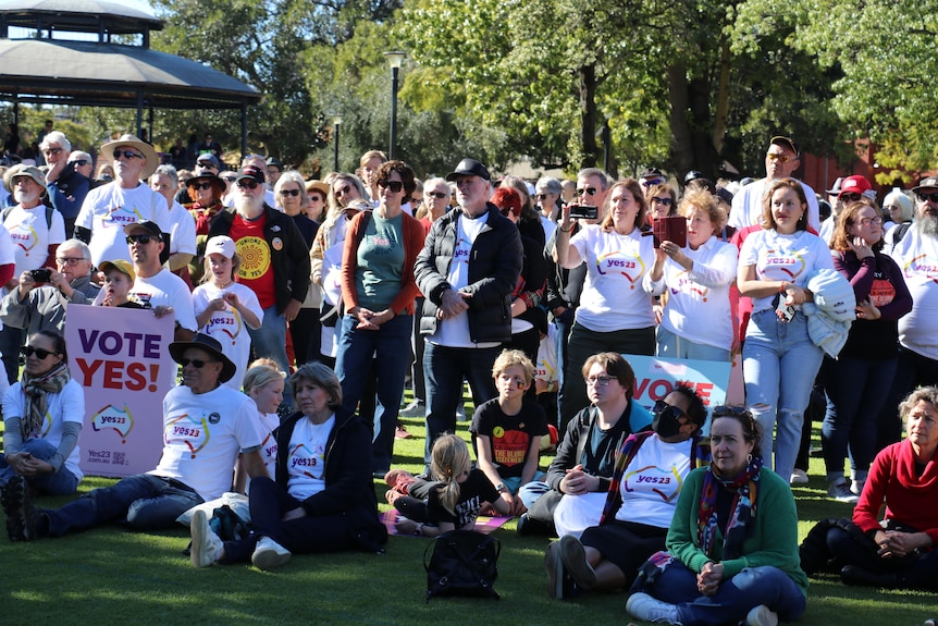 Rally attendees in Perth hold signs at the Come Together For Yes event in Russell Square