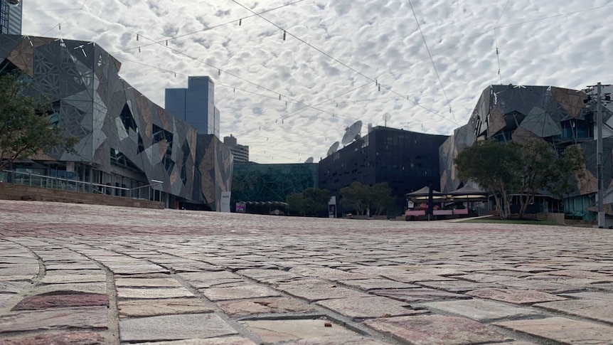 Federation Square with not a single soul in the pedestrian areas.