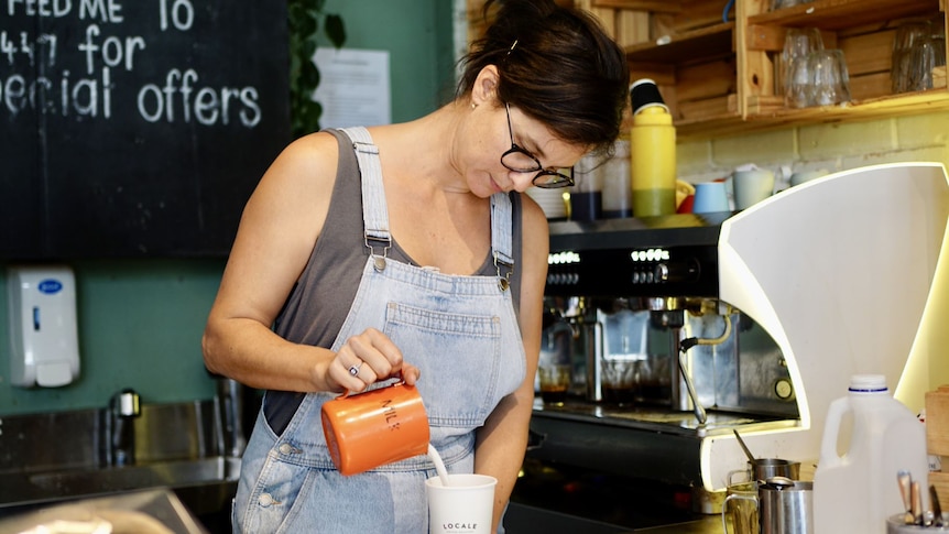 Sarah Yates, pouring coffee