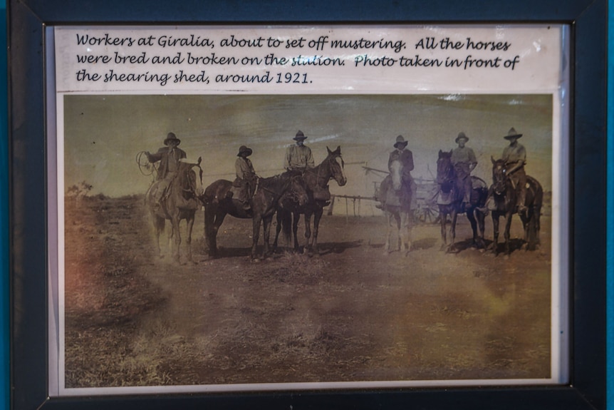 A photo on a wall of people on horseback at Giralia Station.
