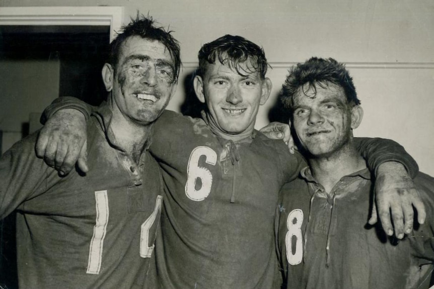 Des Webb, Keith Howard and Cliff Robinson after the 1959 reserve grade grand final. 