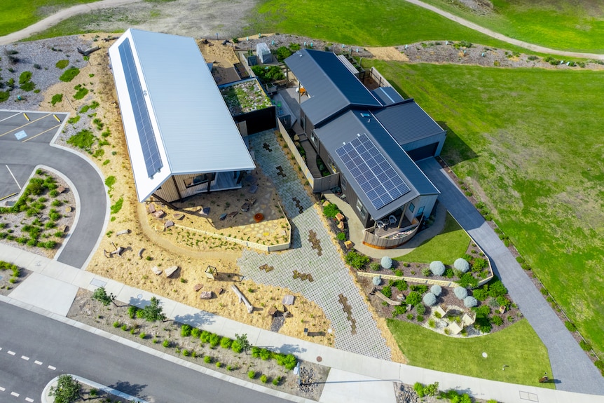 An aerial shot of two recently built houses side-by-side