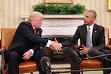 President Barack Obama and President-elect Donald Trump shake hands.