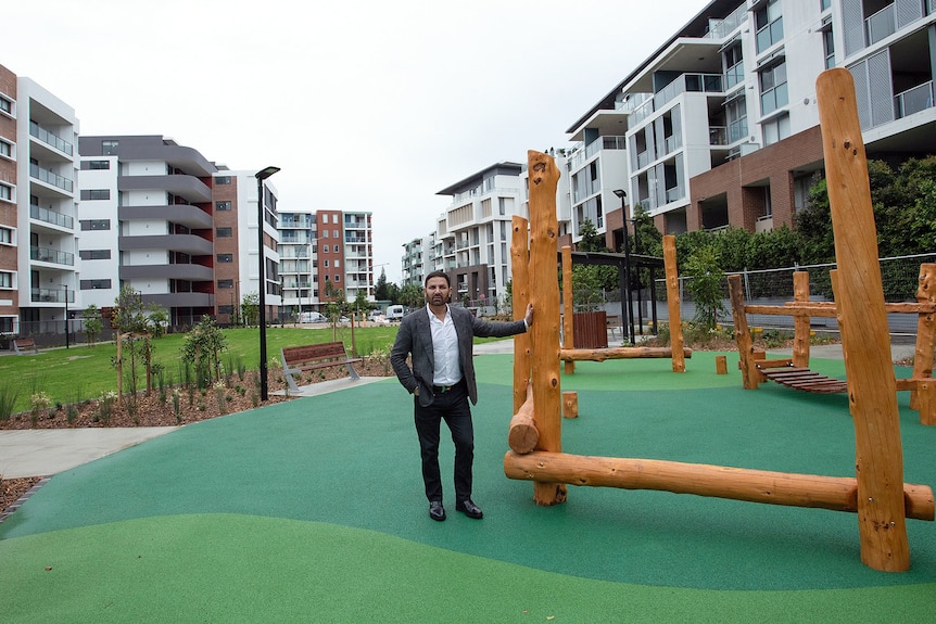 property developer jean nassif stands in a childrens playground
