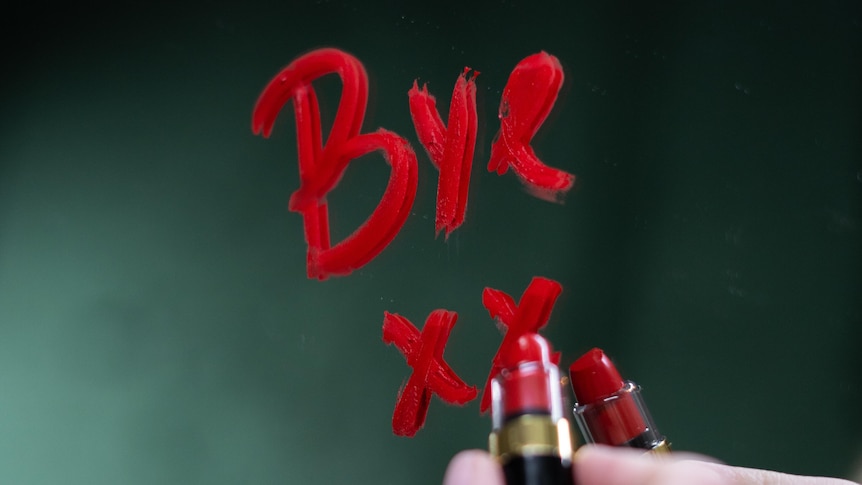 The word 'bye' written in lipstick on a mirror in a story about do break-ups show our true colours.