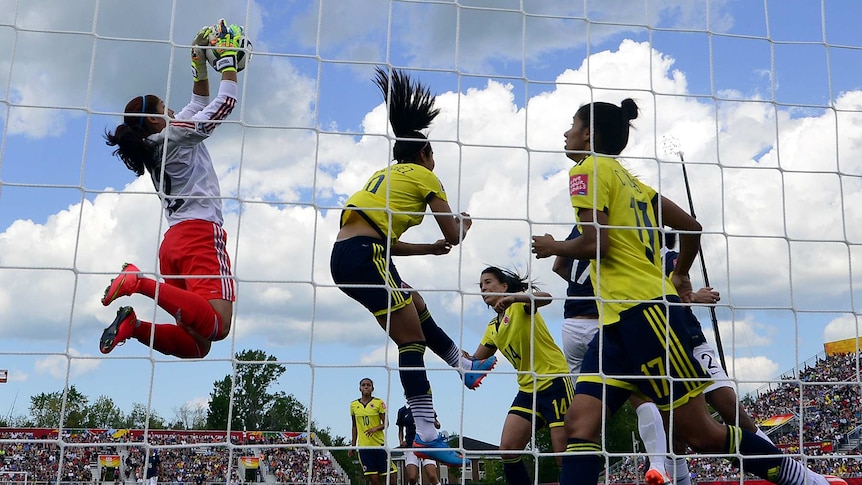 Colombia's goalkeeper Sandra Sepulveda stops the ball