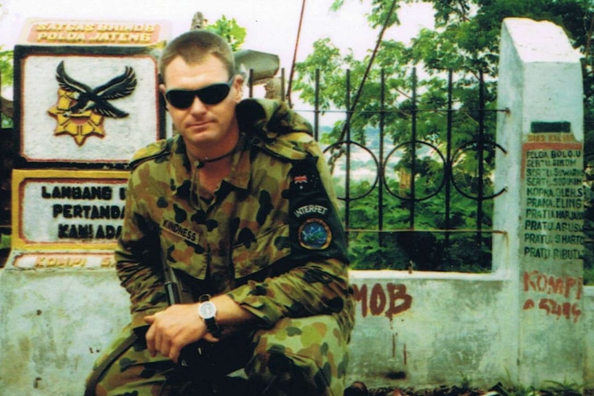 An Australian Army soldier in uniform overseas.