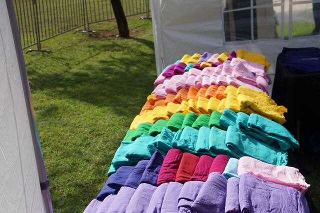 Rows of colourful turbans ready for people to wear as part of the Turbans and Trust program.