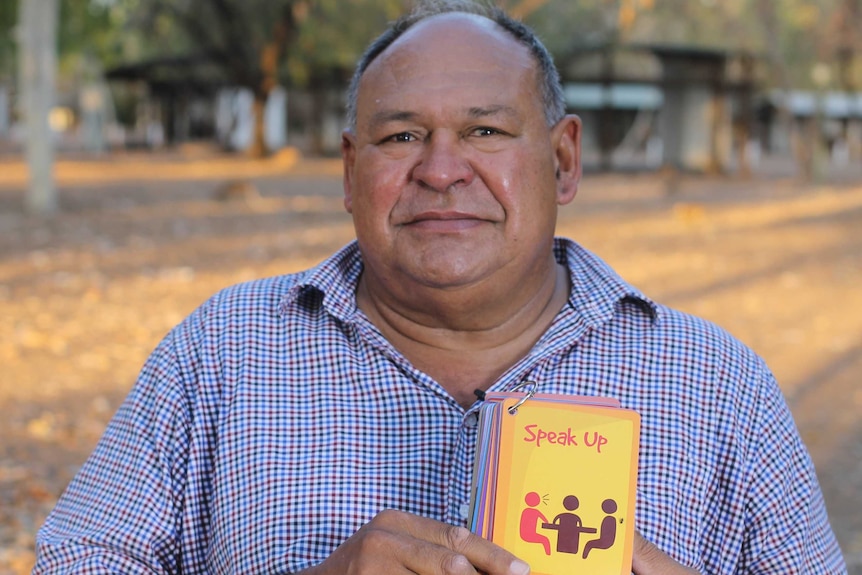 Lindsay Greatorex sitting in front of blurred out background with Blurred border story card that says "speak up"